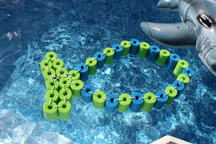 DIY-Pool-Noodle-Fish-Float-With-Headrest-in-the-pool